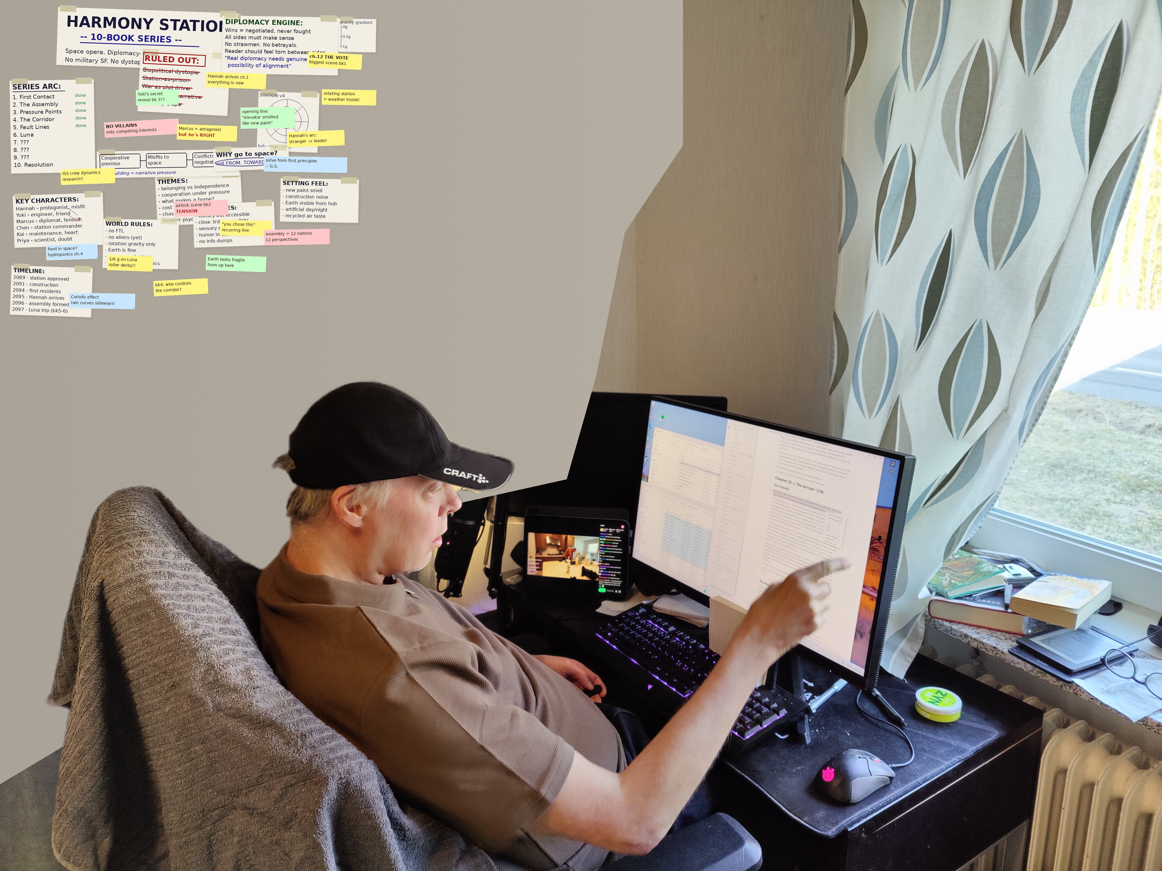 Gunnar at his desk in front of the 10-book series planning wall.